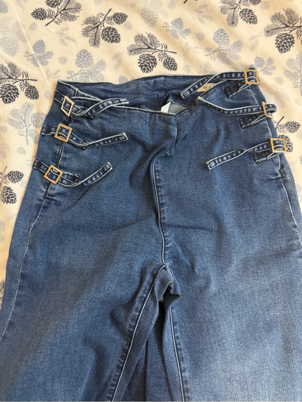Mid-Rise Blue Flare Jeans with Buckle Strap Detail